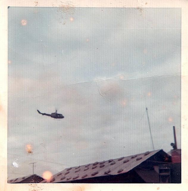 Huey over Camp Evans1