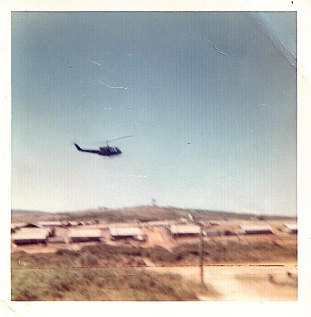 Huey over Camp Evans2