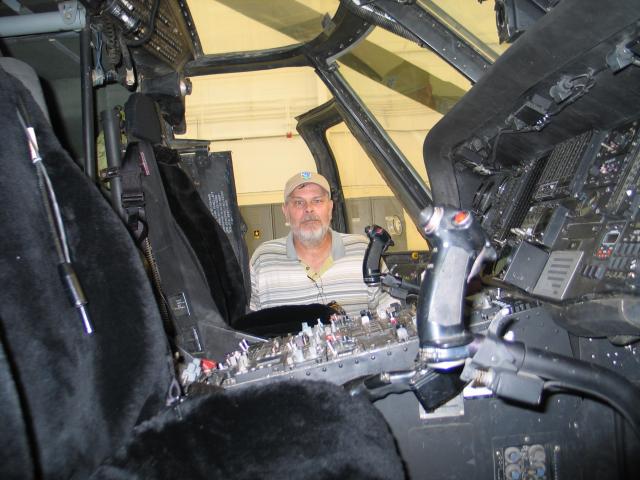 Jim Roesch viewing the Blackhawk cockpit